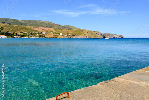 Crystal clear waters next to Andros Town. Andros Island, Cyclades, Greece