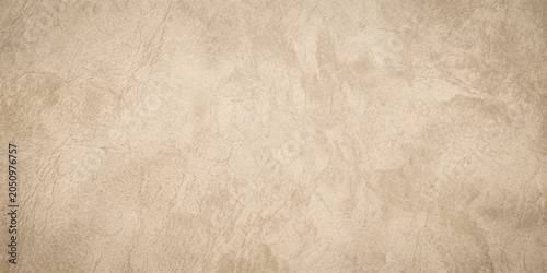 Bild auf Leinwand Crinkled caramel leather suede texture background in warm tan for luxury fashion