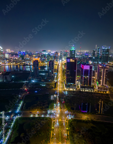 Obraz na plátne Aerial view of Ho Chi Minh City (Saigon), Vietnam, at night with glowing skyline