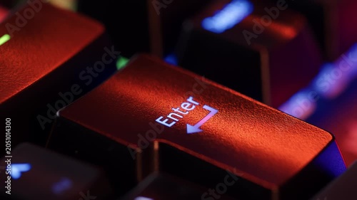 Person is in doubt whether to press the enter key or not. The finger hovers over the enter key for a few seconds before deciding to press it. Yes or no concept. A heavy dicision do it or not.