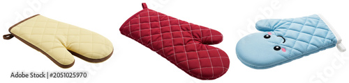 Three oven mitts: one yellow, one red, and one blue with a cute face, isolated on a white background.