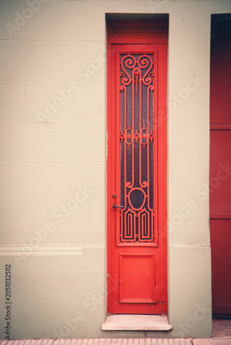 old narrow red door