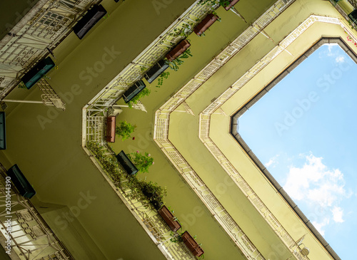 Obraz na plátně Looking skyward in the courtyard of an Art Nouveau building in Budapest's Jewish Quarter, Hungary