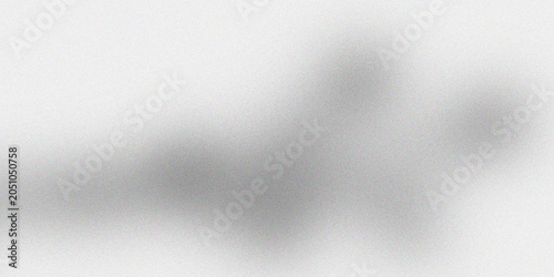 Valokuva Abstract grey grainy texture background with soft light diffusion and subtle monochromatic clouds for minimalistic design layout