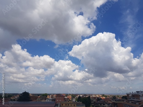 Cityscape Under Dramatic Cloudy Sky