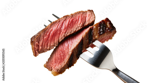 Foto Juicy medium-rare steak slices on fork