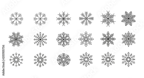 Collection of various snowflakes on white.