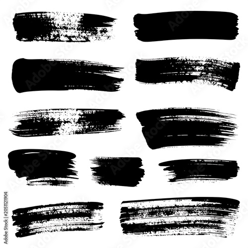 A collection of 10 black brush strokes on a white background