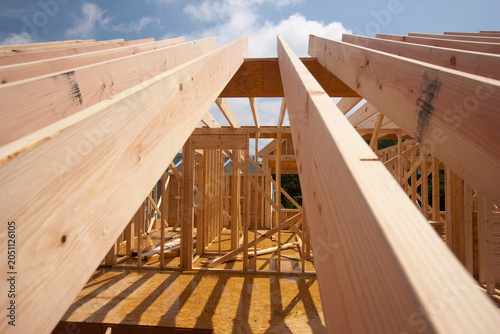 Low angle view of roof rafters of a house