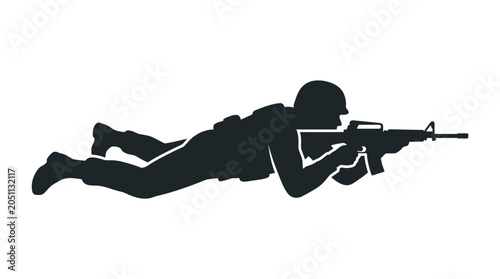 Silhouette of a soldier aiming a rifle while lying down.