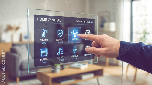 Hand touching transparent smart home control screen in living room