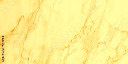 Golden yellow marble texture background with orange veins for luxury design and decoration