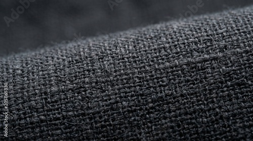 Extreme macro texture of dark organic material with fine lines. An extreme close-up macro photograph showing the detailed structure, natural fiber lines, and rich dark texture of an organic abstract 