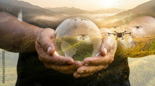 Low altitude economy double exposure, hands holding globe, drone agriculture and sustainability, landscape of agricultural land