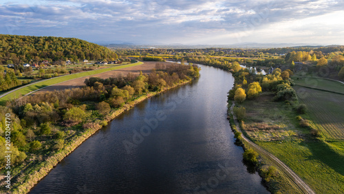 Obraz na plátně Aerial view of the Vistula River in Poland at sunset in spring
