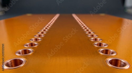 Substrate integrated waveguide via fence channel in LCP
