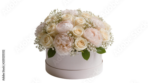 Foto Creamy white roses and peonies floral arrangement in a round hat box
