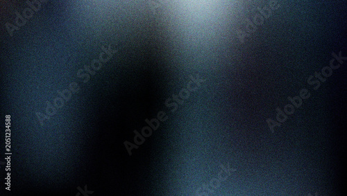Foto Dark blurry figure silhouetted against a gradient of blue and black tones