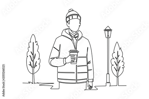 Schilderij op canvas Man wearing puffer jacket in autumn season