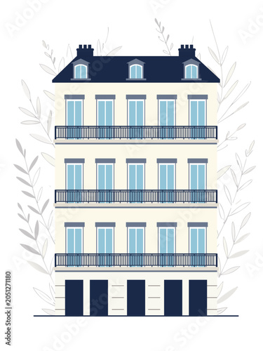 Charming Parisian apartment building with elegant architectural details.