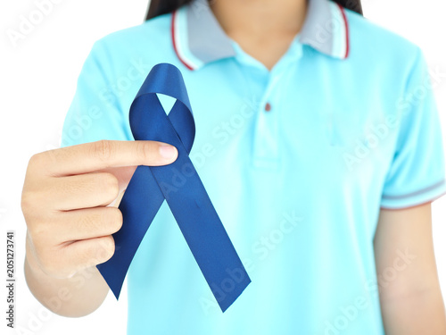 World cancer day February 4. Woman holding blue ribbon for cancer awareness month. Healthcare and world cancer day concept.