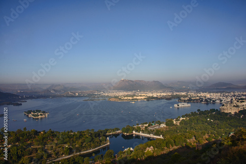 View of the City Palace, Lake Palace, Monsoon Palace, and Lake Pichola, Udaipur, Rajasthan, India