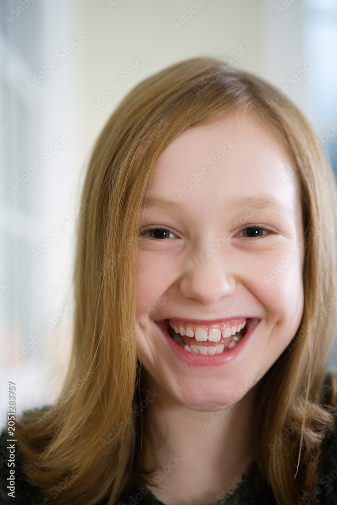 Fototapeta premium Portrait of a girl smiling