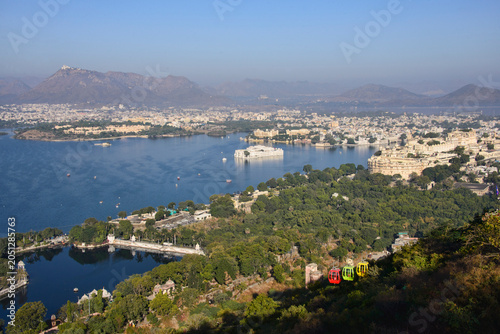 View of the City Palace, Lake Palace, Monsoon Palace, and Lake Pichola, Udaipur, Rajasthan, India