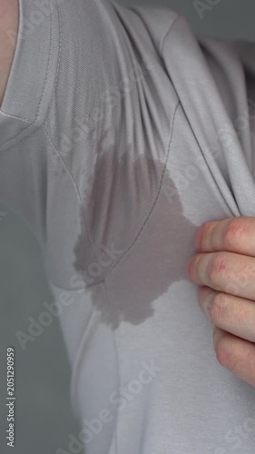 Sweat on clothes.
A sweat stain on a guy's arm on a hot day.