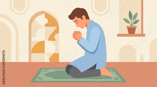 Foto Man praying on a green mat indoors.