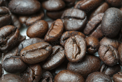 Dark roasted coffee beans  ,close up used  background
