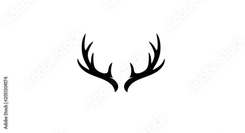 Fotografie Elegant deer antlers silhouette on a clean white background, minimalist nature symbol
