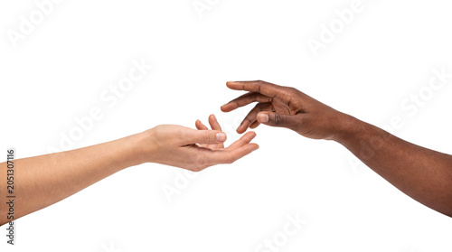 Photos Two hands reaching towards each other in connection