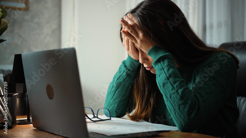 Bild auf Leinwand Young secretary feeling frustrated and stressed in her office due to long working hours