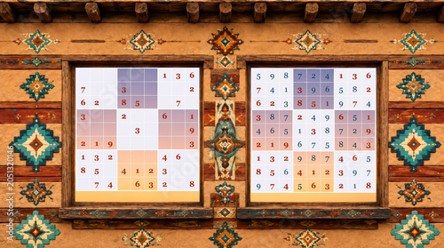 Southwestern pueblo style adobe house window with native american pattern sudoku