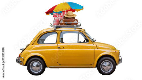 Foto Yellow vintage car loaded with luggage and beach umbrella for vacation