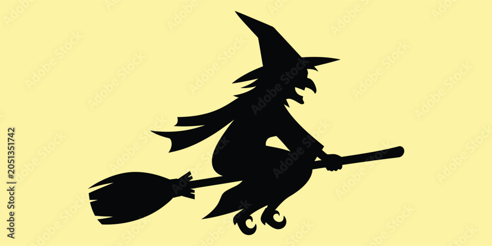 Fototapeta premium Witch flying on broomstick in silhouette against a soft yellow background conceptualizing Halloween and magic