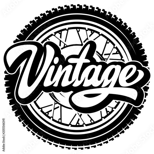 Retro Motorcycle Wheel with Bold Vintage Lettering Design for Bike Enthusiasts and Classic Style Lovers.
