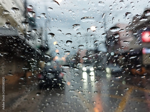 Raindrops on the car window.