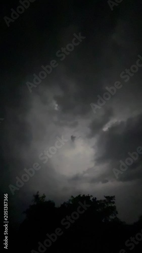 illuminating a stormy sky, intense, natural