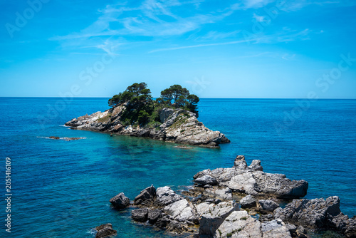 Schilderij op canvas Katic island with pine trees in blue Adriatic sea, Petrovac, Montenegro