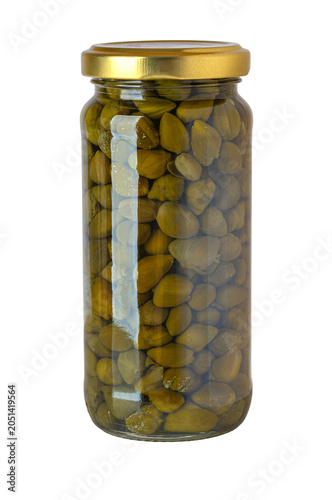 Glass jar with pickled caper berries condiment