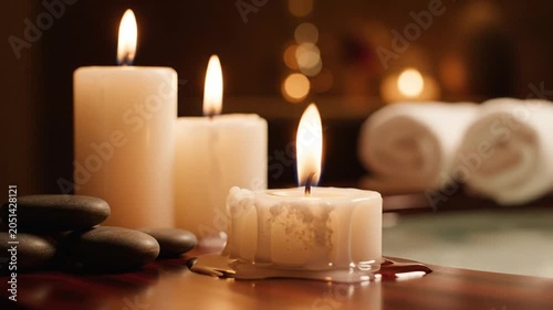 Spa ambiance, candles, towels, relaxation, wellness