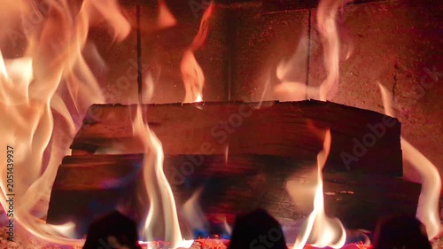 4K Close Up of Log Burning in Fireplace, Intense Flames and Embers, Cozy Indoor Ambiance, Warm Glow, Real Time Footage