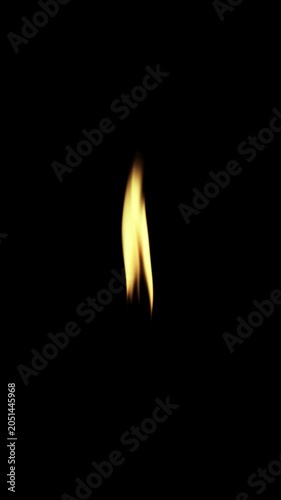 Captivating glow of a realistic candle flame dances in the darkness, showcasing vibrant light and depth