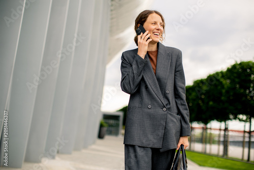 Woman talking on phone whil...