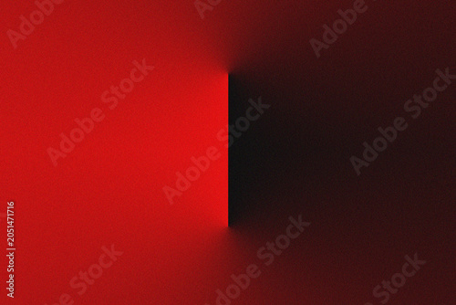 A dark rectangular opening in a red wall with light shining through