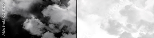 Bild auf Leinwand Fluffy white clouds in dark sky isolated with transparent alpha channel for backgrounds