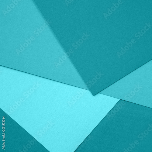 Layered teal paper background with geometric shapes and textured minimalist d...