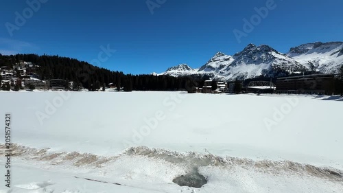 Frozen Lake in Arosa with Snow-Covered Alpine Mountains, Switzerland